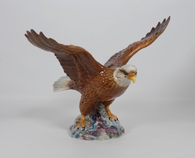 Lot 207 - A Beswick pottery figure of a bald eagle,...