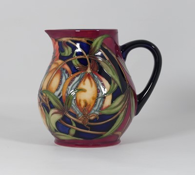 Lot 229 - A Moorcroft pottery jug decorated in the...