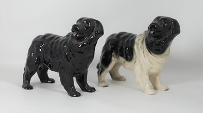 Lot 234 - A glazed pottery figure of a dog, h.16cm;...