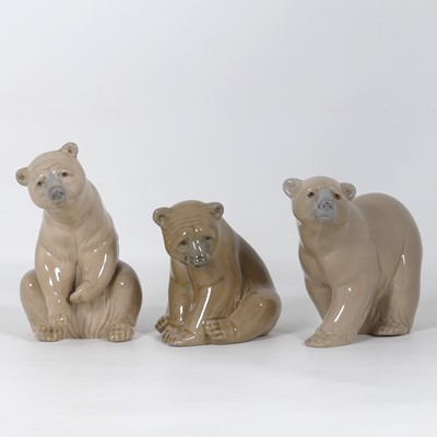 Lot 242 - Three Lladro porcelain figures of bears, the...