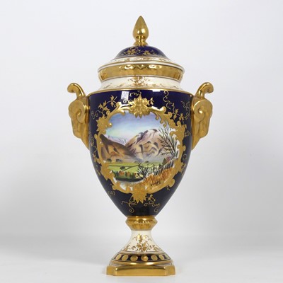 Lot 245 - A Coalport porcelain urn, painted with a view...