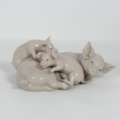 Lot 250 - A Lladro porcelain figure of a sow and piglets,...