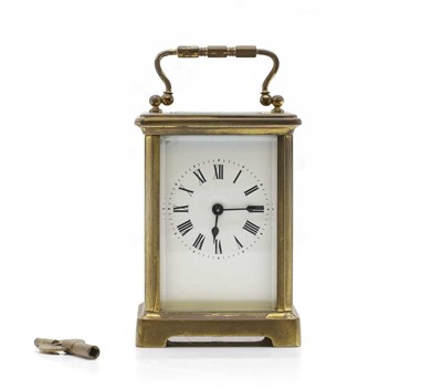 Lot 251 - A lacquered brass cased carriage clock, the...