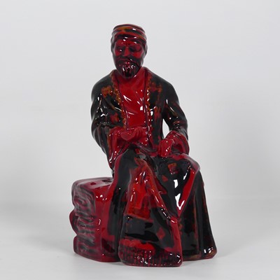 Lot 255 - A Royal Doulton flambé figure 'The Carpet...