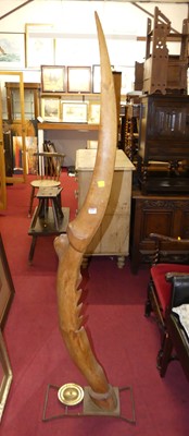 Lot 1111 - A large carved softwood freestanding sculpture...