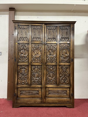 Lot 1126 - A joined and linenfold moulded 'Ipswich' oak...