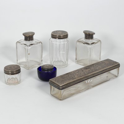 Lot 273 - A collection of various silver lidded dressing...