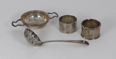 Lot 308 - A pierced silver twin handled strainer,...