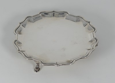 Lot 311 - A George V  silver card waiter, having a...