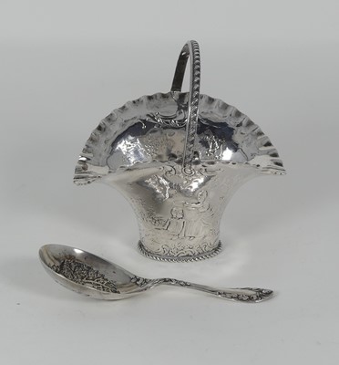 Lot 313 - A George V silver caddy spoon, the bowl...