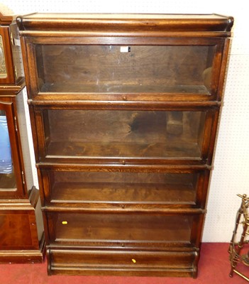 Lot 1127 - A 1930s Globe Wernicke oak four-tier stacking...