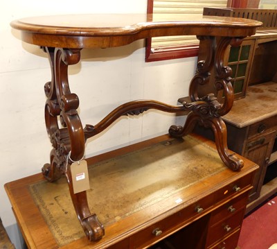 Lot 1141 - A mid-Victorian figured walnut kidney shaped...