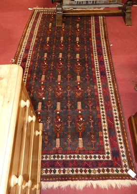 Lot 1150 - A Persian woollen deep blue and red ground...