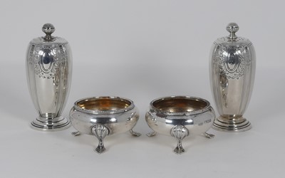 Lot 320 - A pair of George V silver table salts,...