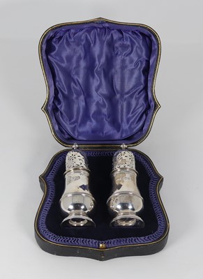 Lot 334 - A pair of George V silver sifters, each of...