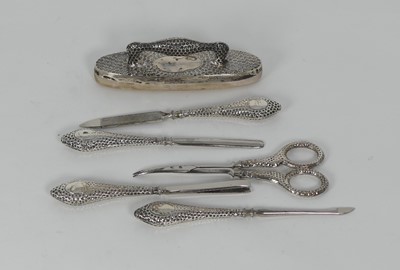 Lot 336 - A set of silver handled dressing table implements