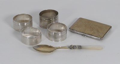 Lot 346 - A set of three silver napkin rings, together...