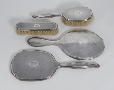 Lot 352 - A set of three George V dressing table items,...