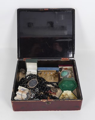 Lot 353 - A Japanese lacquer box containing a collection...