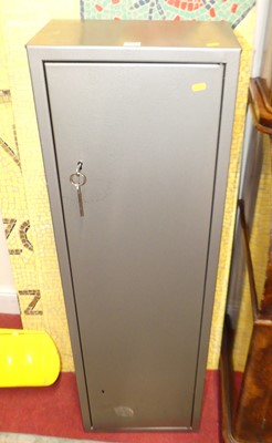 Lot 1166 - A grey painted steel single door gun cabinet,...