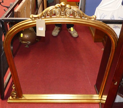 Lot 1181 - A contemporary gilt framed arched overmantel...