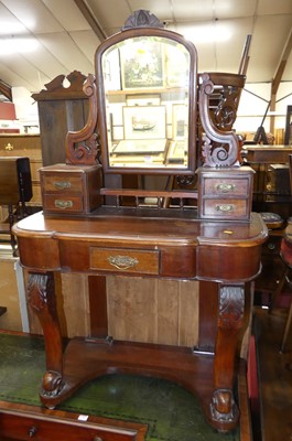 Lot 1197 - A mid-Victorian mahogany swing mirror back...