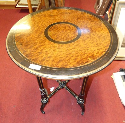 Lot 1200 - A mid-Victorian amboyna ebonised and gilt...