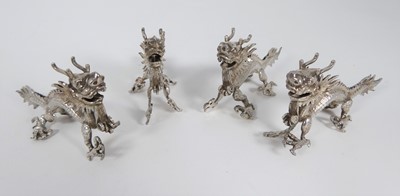 Lot 489 - A collection of four Chinese white metal...