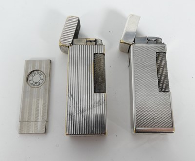 Lot 490 - A Dunhill pocket cigarette lighter, together...