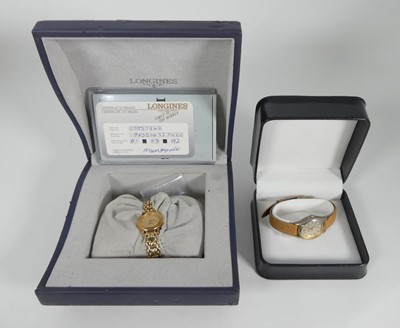 Lot 494 - A Longines lady's wristwatch, boxed, together...