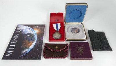 Lot 497 - A collection of commemorative coins and...