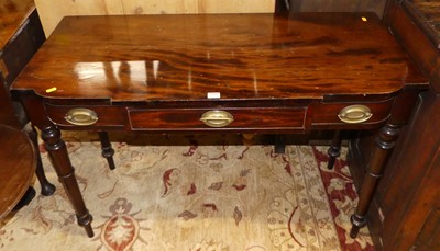 Lot 1233 - A 19th century mahogany breakfront single...