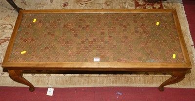 Lot 1234 - A beech rectangular coffee table, inset with...