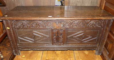 Lot 1320 - An 18th century joined oak two-panel hinge...