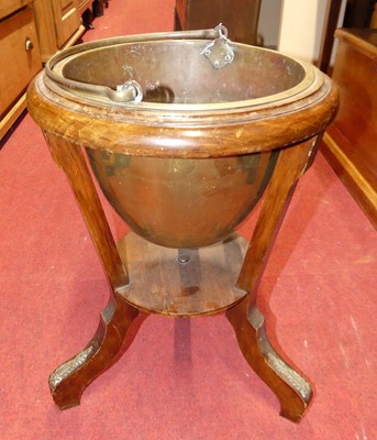 Lot 1239 - An early 20th century walnut low jardiniere...