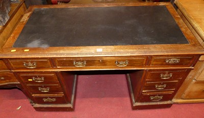 Lot 1242 - A late Victorian walnut and rexine inset twin...