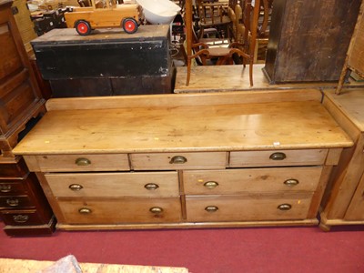 Lot 1246 - A Victorian pine long dresser base, fitted...