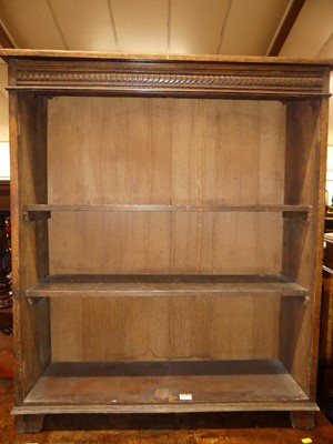 Lot 1250 - A 1930s small oak low freestanding open...