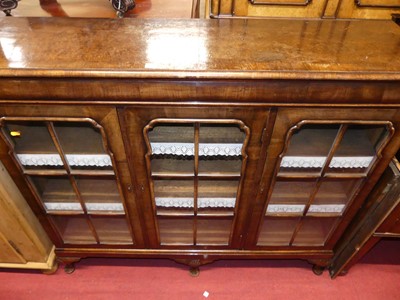 Lot 1251 - An early 20th century figured walnut and...