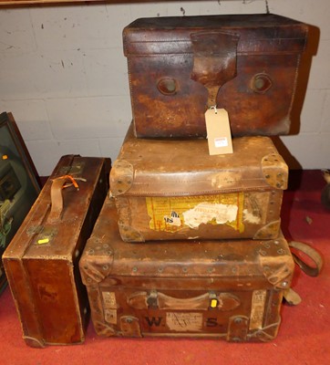 Lot 1076 - An Edwardian leather trunk, with old shipping...