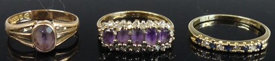 Lot 399 - A 9ct gold amethyst set dress ring, size L;...