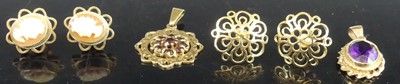 Lot 418 - A pair of modern 9ct gold flower head ear...