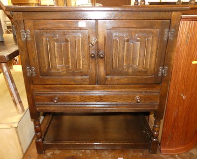 Lot 1263 - A contemporary linenfold moulded oak double...