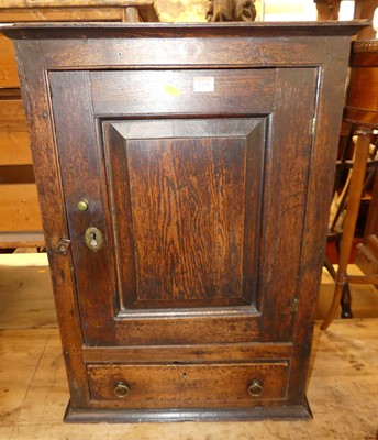 Lot 1275 - An 18th century provincial oak single door...