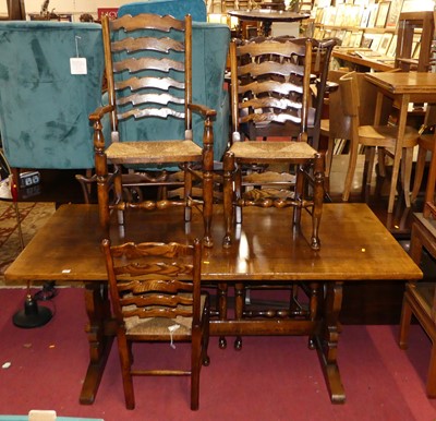 Lot 1312 - A Titchmarsh & Goodwin joined oak dining suite,...