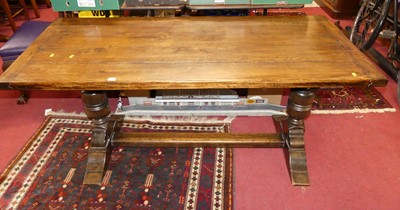 Lot 1318 - A joined oak plank top refectory table, having...