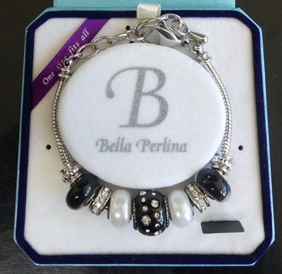 Lot 429 - A boxed Bella Perlina polished steel charm...