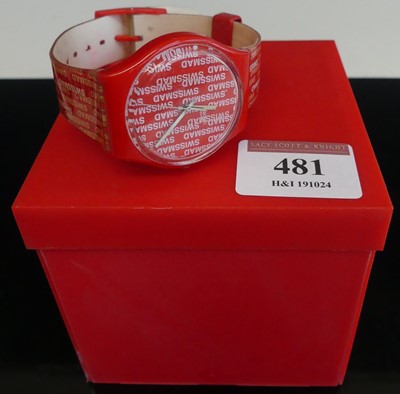 Lot 481 - A Swatch wristwatch, having Swissmad red dial...