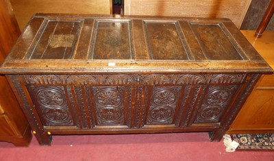 Lot 1384 - An 18th century joined oak and later relief...