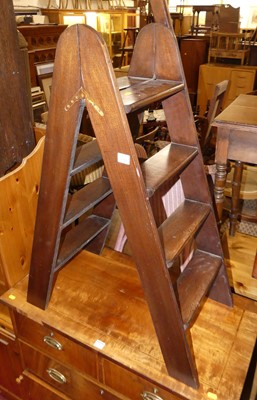 Lot 1385 - A mahogany set of A-frame hinged four tread...